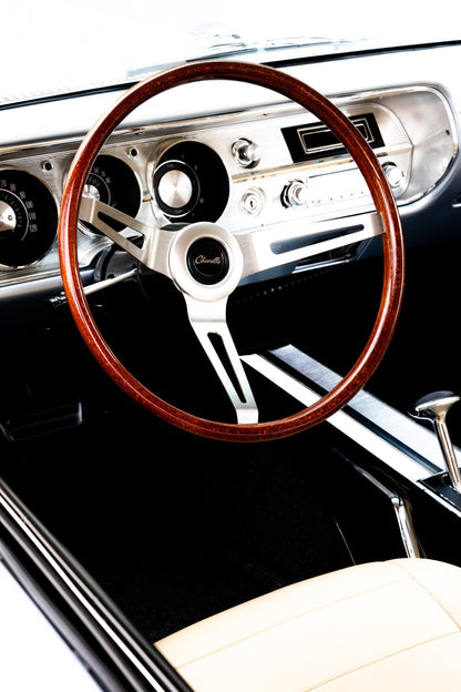 Photography by Salt Creek Prints of: Chevelle 7916, Close up image of the steering wheel and dash of a vintage Chevy Chevelle. 