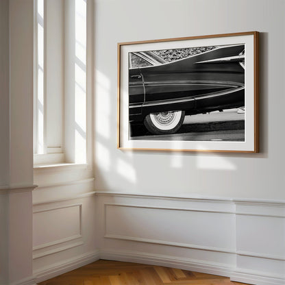 Framed photo of: Cadillac Fleetwood 7961 displayed on a wall in a luxury hallway.