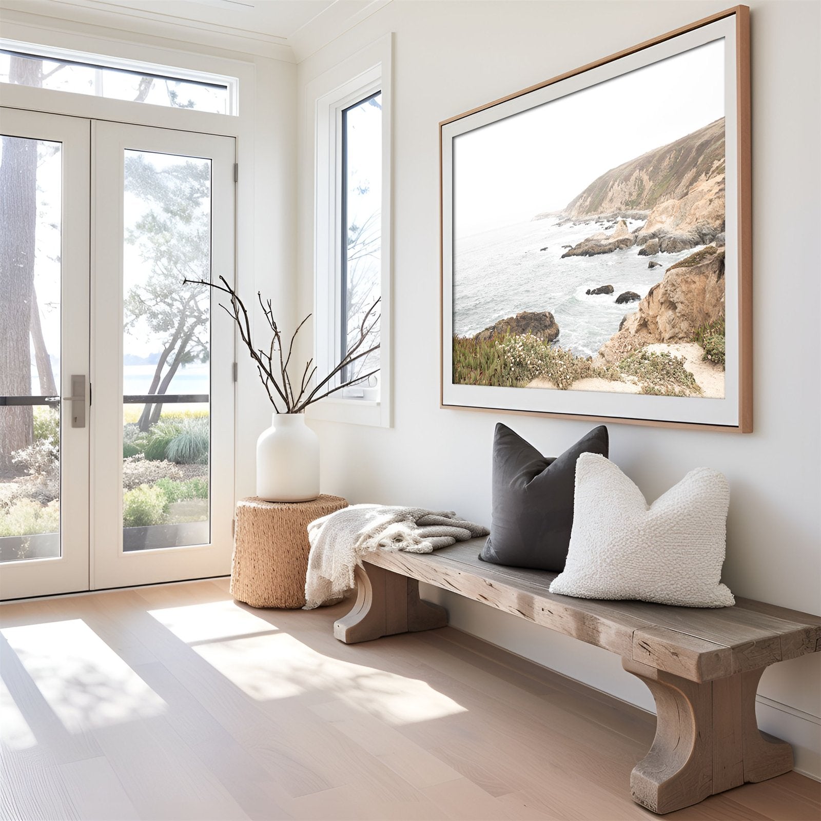 Framed photo of: Bodega Head 7728 displayed above a bench in an entry way.