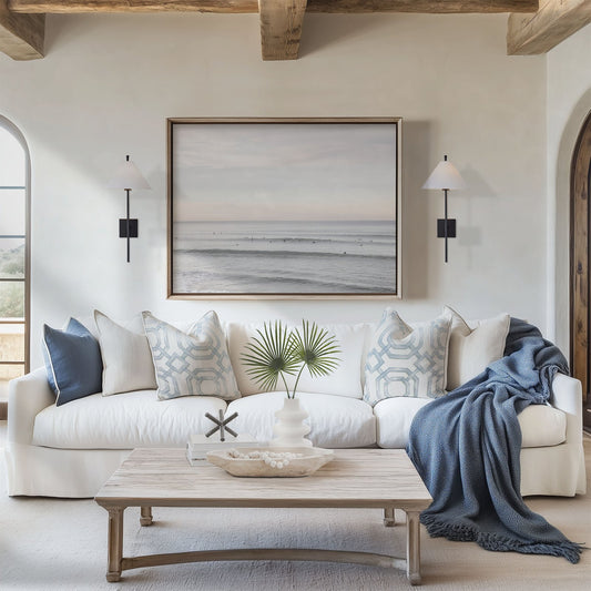 Framed photo of: Del Mar 9616 displayed above a couch in a coastal living room.