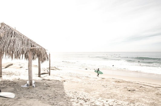 Photography by Kim Dybczak of: Waves break at WindanSea Beach in La Jolla under bright coastal light.