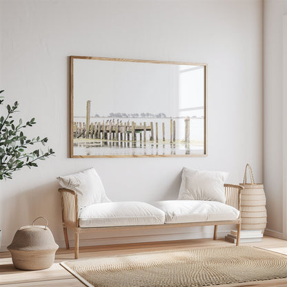 Framed photo of: Bodega Bay Pier 7637 displayed above a couch.