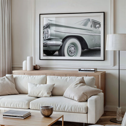 Framed photo of: Bel Air 7855 displayed above a couch in a living room.