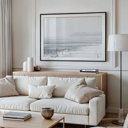 Framed photo of: Del Mar 5829 displayed above a couch in a living room.