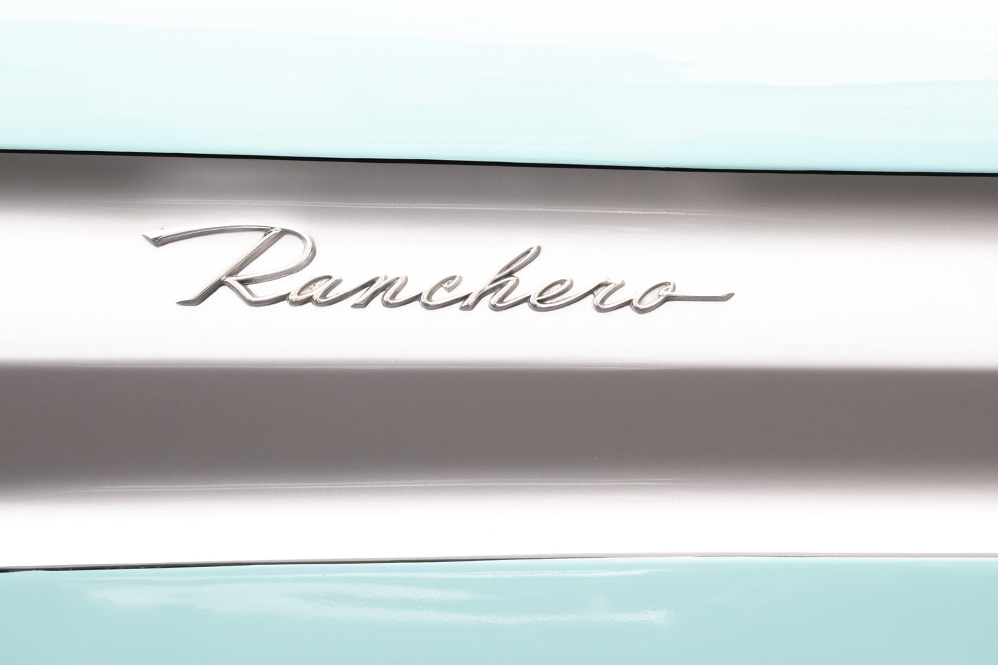 Photography by Salt Creek Prints of: Ranchero 7781, Close up image of the Ranchero logo from a vintage Ford Ranchero.