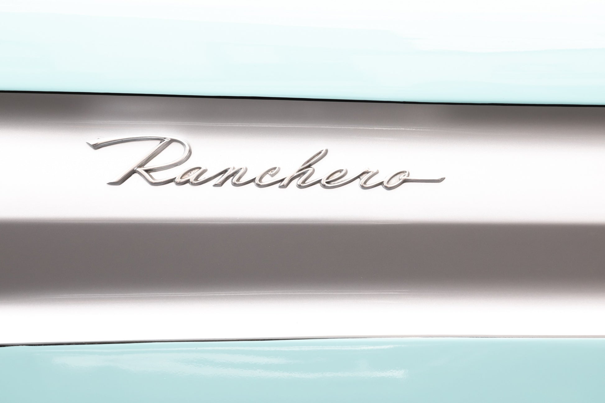Photography by Salt Creek Prints of: Ranchero 7781, Close up image of the Ranchero logo from a vintage Ford Ranchero.