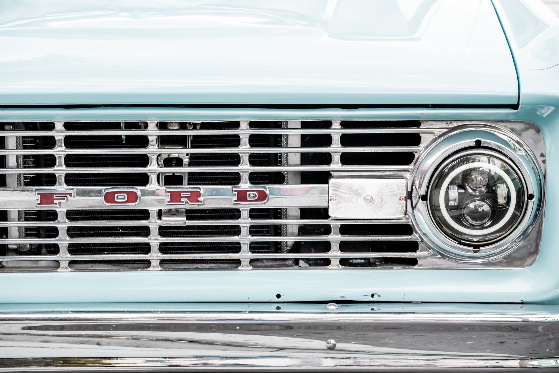 Photography by Salt Creek Prints of: Vintage Ford 7815, Close up image of the grill of a vintage Ford truck.