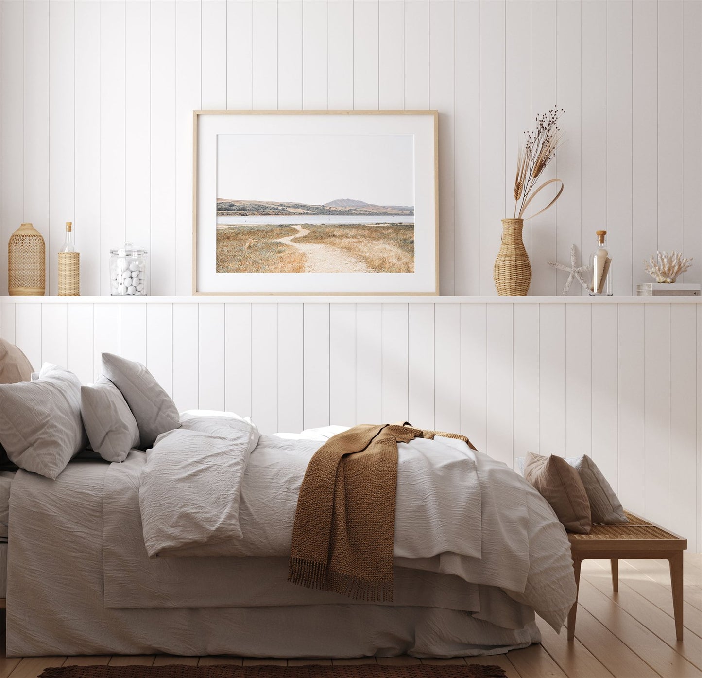 Framed photo of: Tomales Bay 7149 displayed above a bed in a farmhouse bedroom.