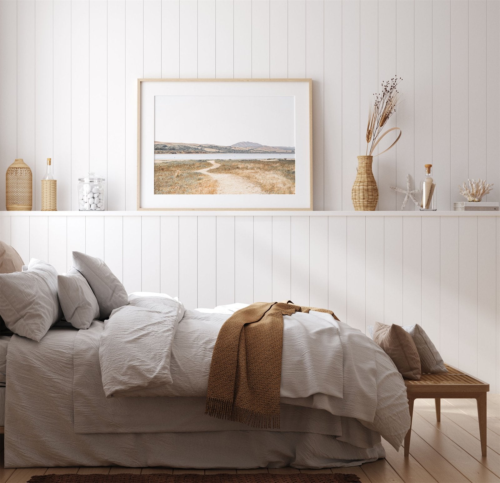 Framed photo of: Tomales Bay 7149 displayed above a bed in a farmhouse bedroom.