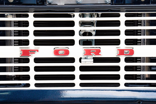 Photography by Salt Creek Prints of: Ford 8030, Close up image of the front grill of a vintage ford F-Series pickup.