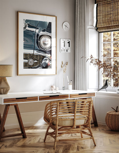 Framed photo of: Chevrolet 7808 displayed above a desk in a neutral office.