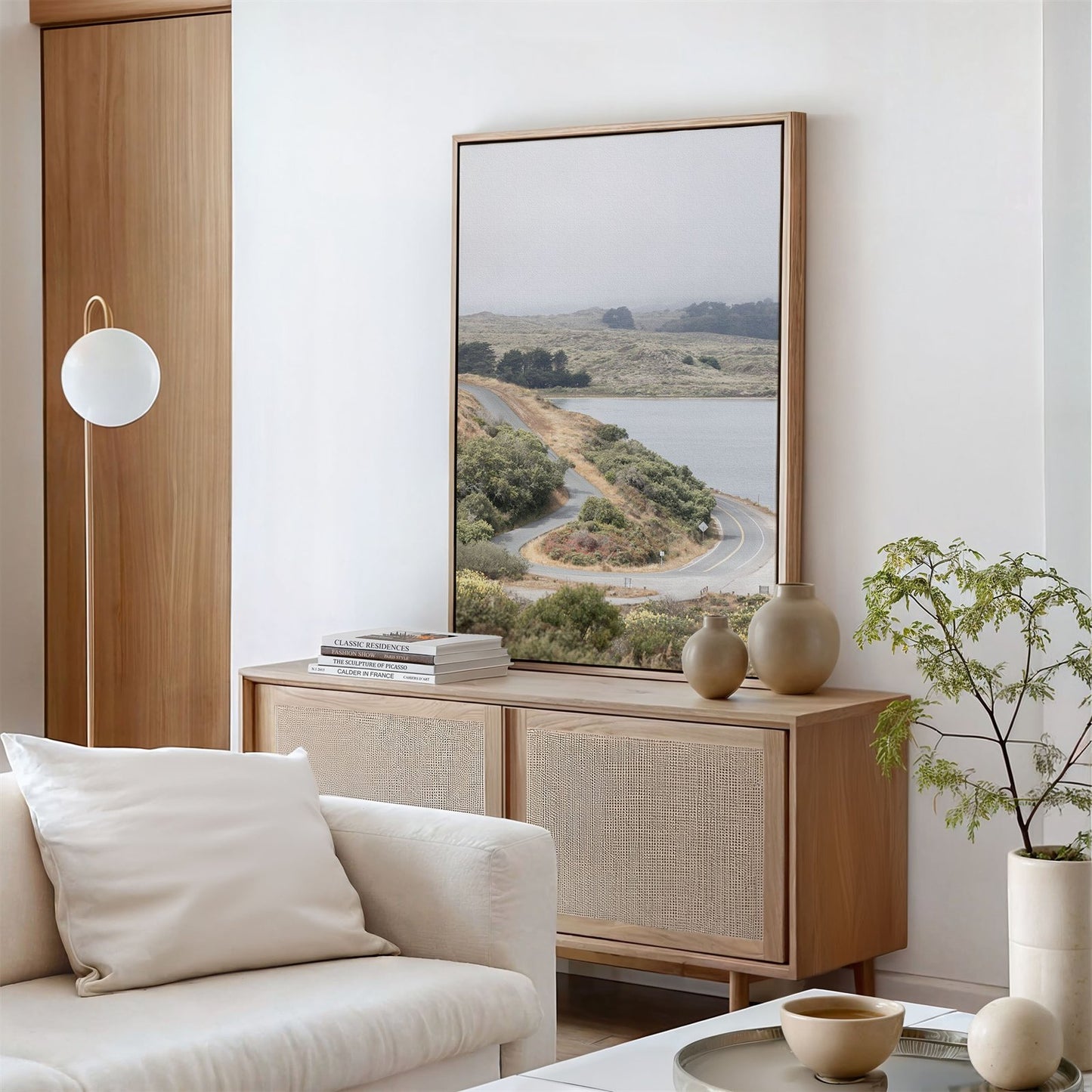 Framed canvas photo of: Bodega Bay 7763 displayed on a wall above a console in a modern living room.