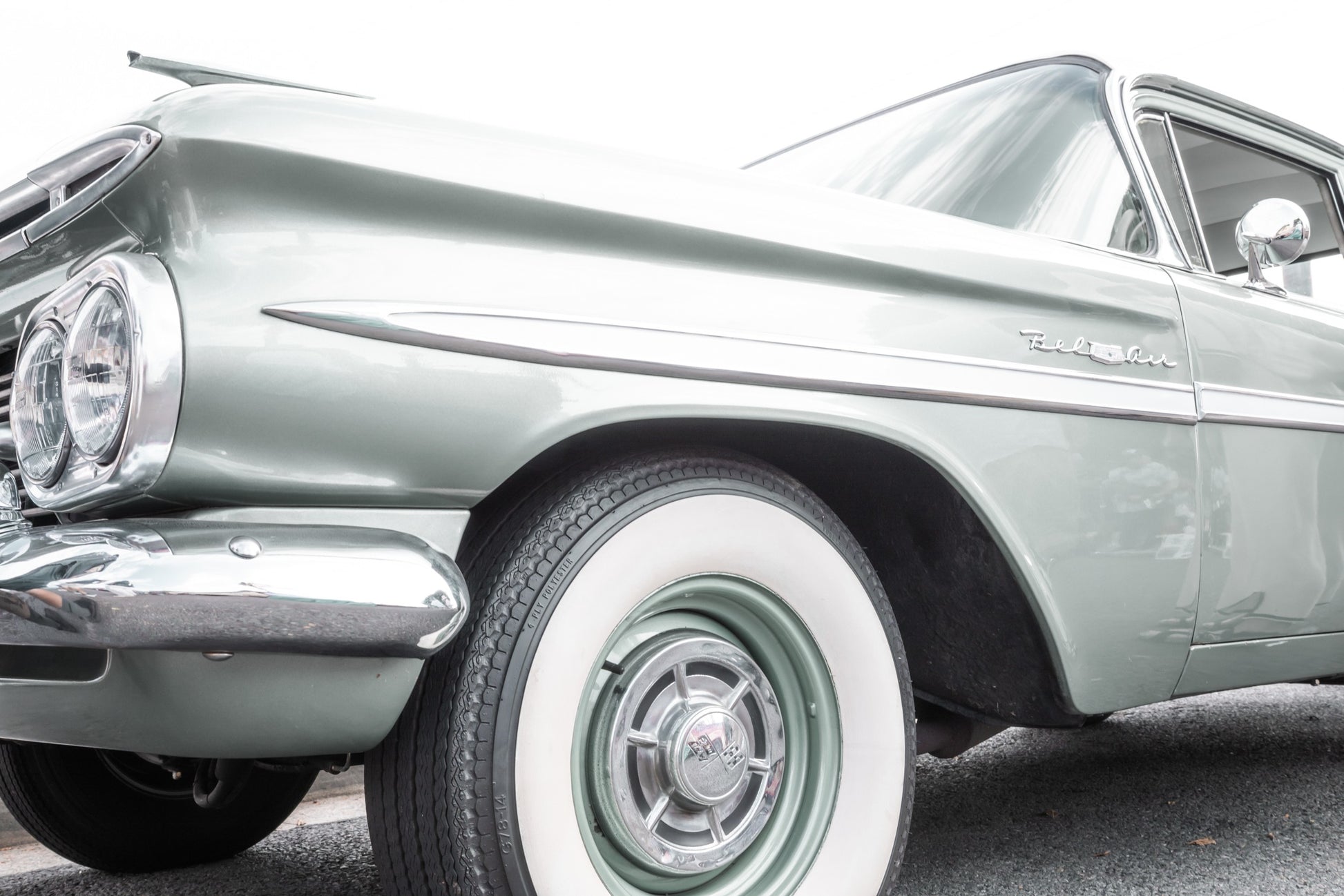 Photography by Salt Creek Prints of: Bel Air 7855, Close up image of the front side of a classic Chevrolet Bel Air in mint green.