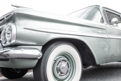 Photography by Salt Creek Prints of: Bel Air 7855, Close up image of the front side of a classic Chevrolet Bel Air in mint green.