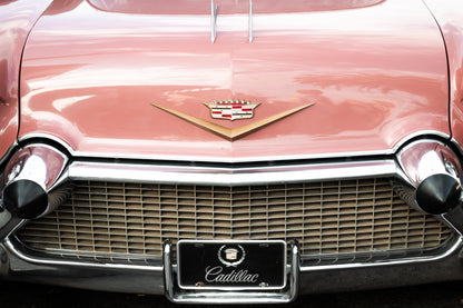 Photography by Salt Creek Prints of: Cadillac 7917, Close up image of the back of a vintage classic Cadillac in rosy pink.