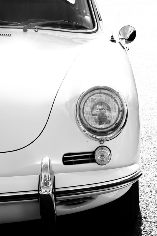 Photography by Salt Creek Prints of: Porsche 8259, Close up image of the front of a classic vintage Porsche in black and white.