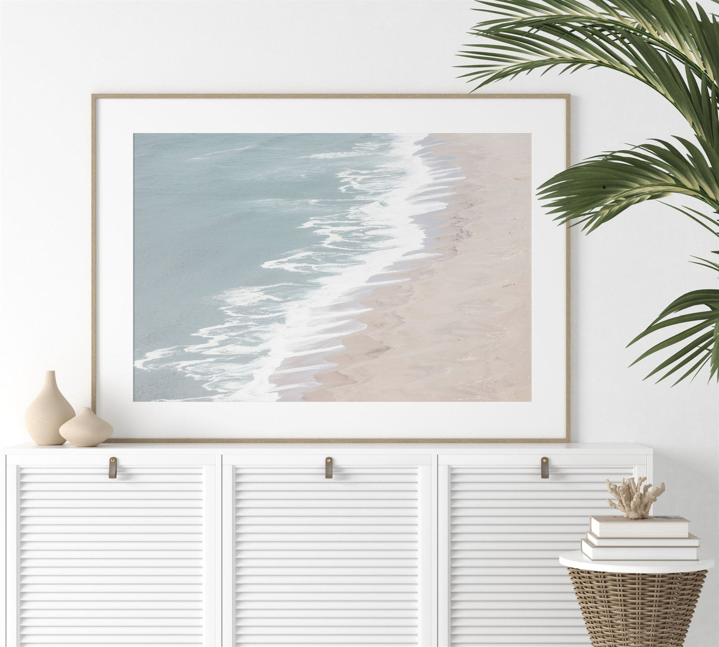 Framed photo of: Point Reyes Beach 7403 displayed above a white console.