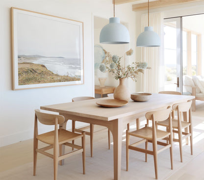 Framed photo of: Salmon Creek Beach 7456 displayed on a wall in a dining room.