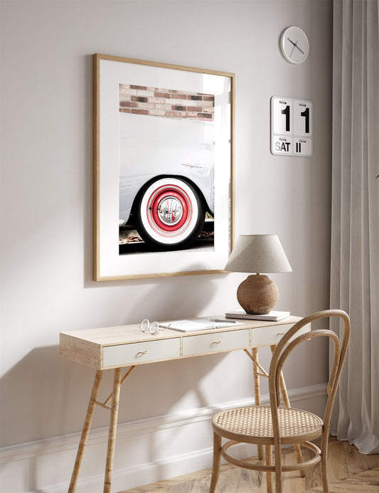 Framed photo of: Chevy Power 7793 displayed above a desk in a neutral office.