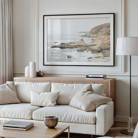 Framed photo of: Bodega Head 7709 displayed above a couch.