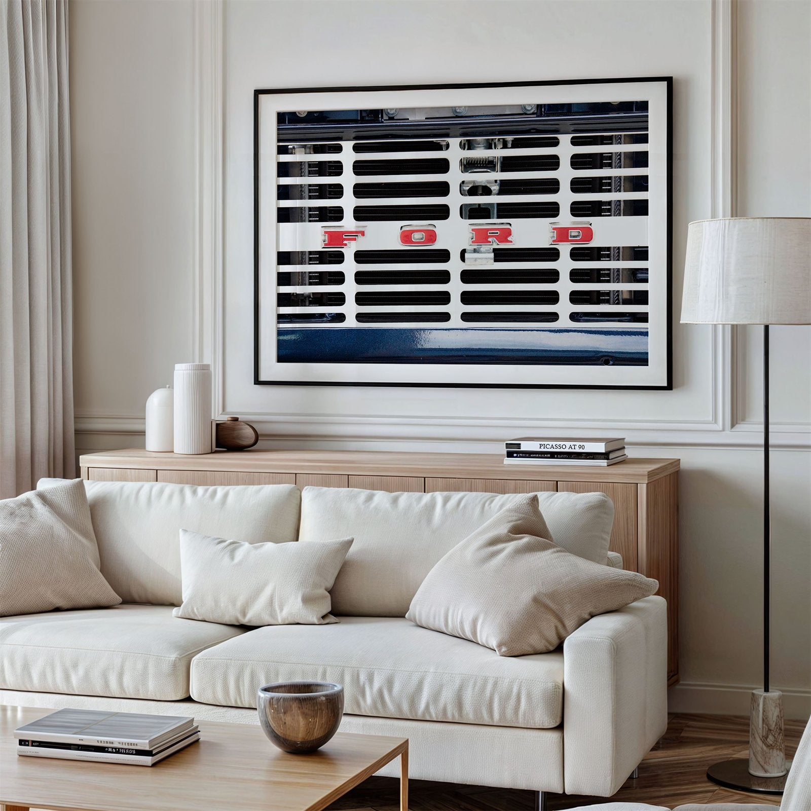 Framed photo of: Ford 8030 displayed on a wall above a couch in a neutral living room.