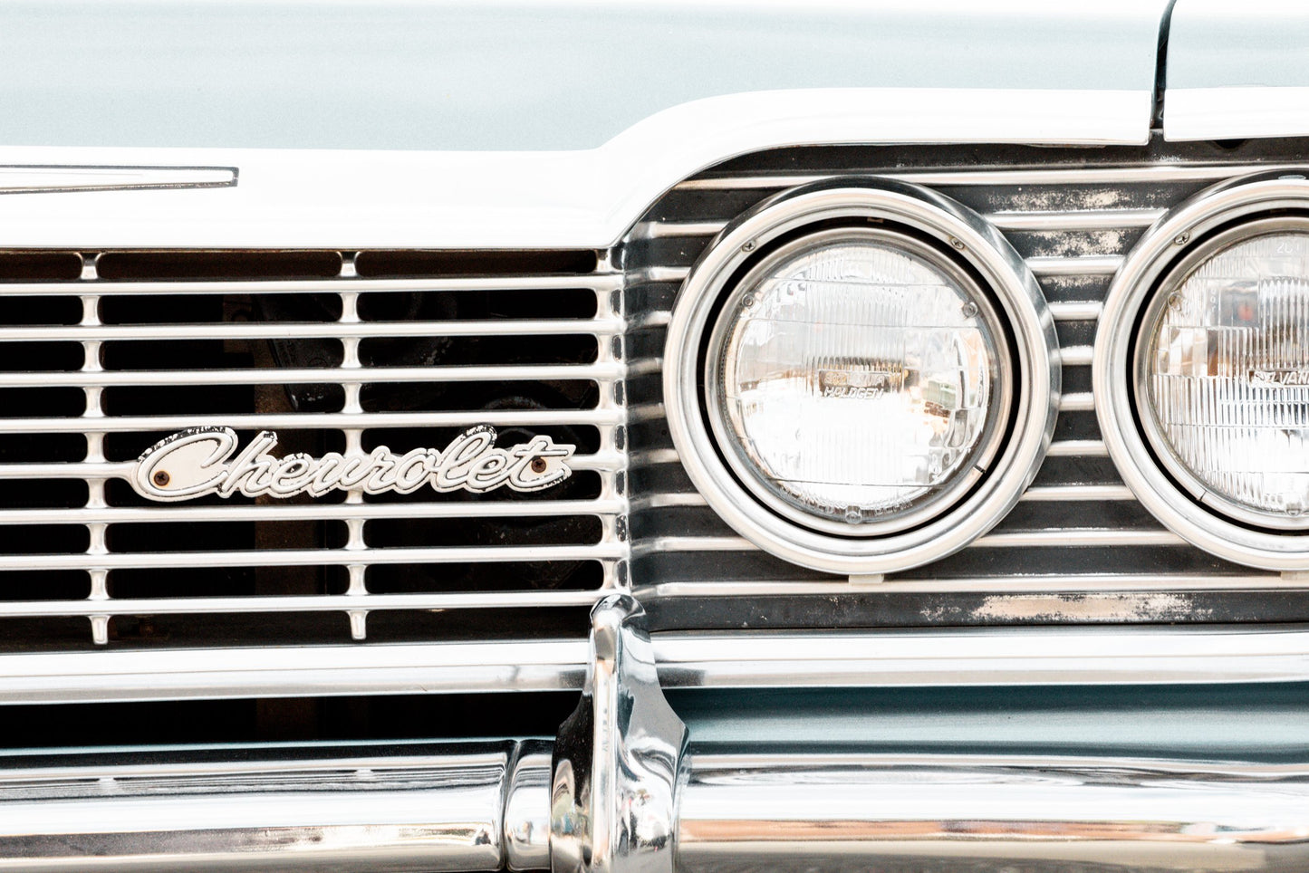 Photography by Salt Creek Prints of: Chevrolet 7965, Close up image of the front of a vintage Chevrolet in mint green.