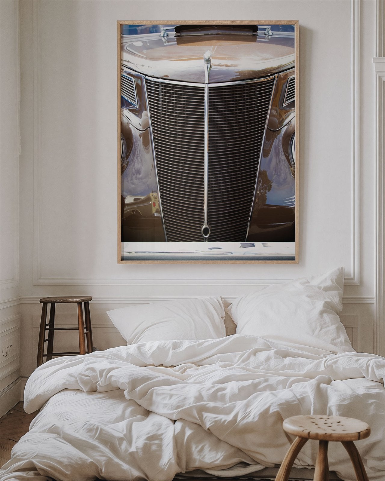 Framed photo of: Ford 7803 displayed above a bed in a cozy bedroom. 
