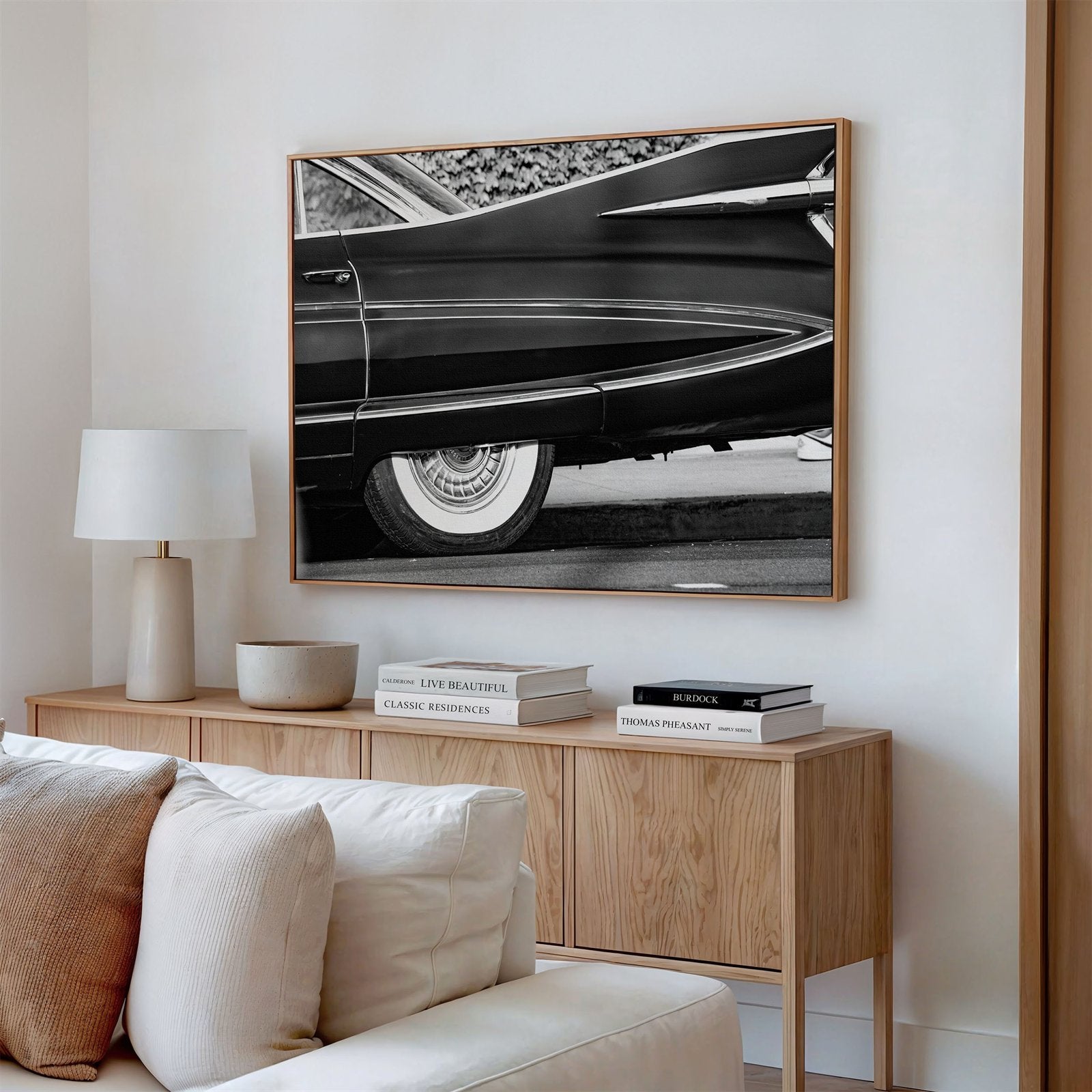 Framed canvas photo of: Cadillac Fleetwood 7961 displayed above a couch in a modern living room. 
