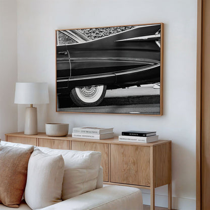 Framed canvas photo of: Cadillac Fleetwood 7961 displayed above a couch in a modern living room. 