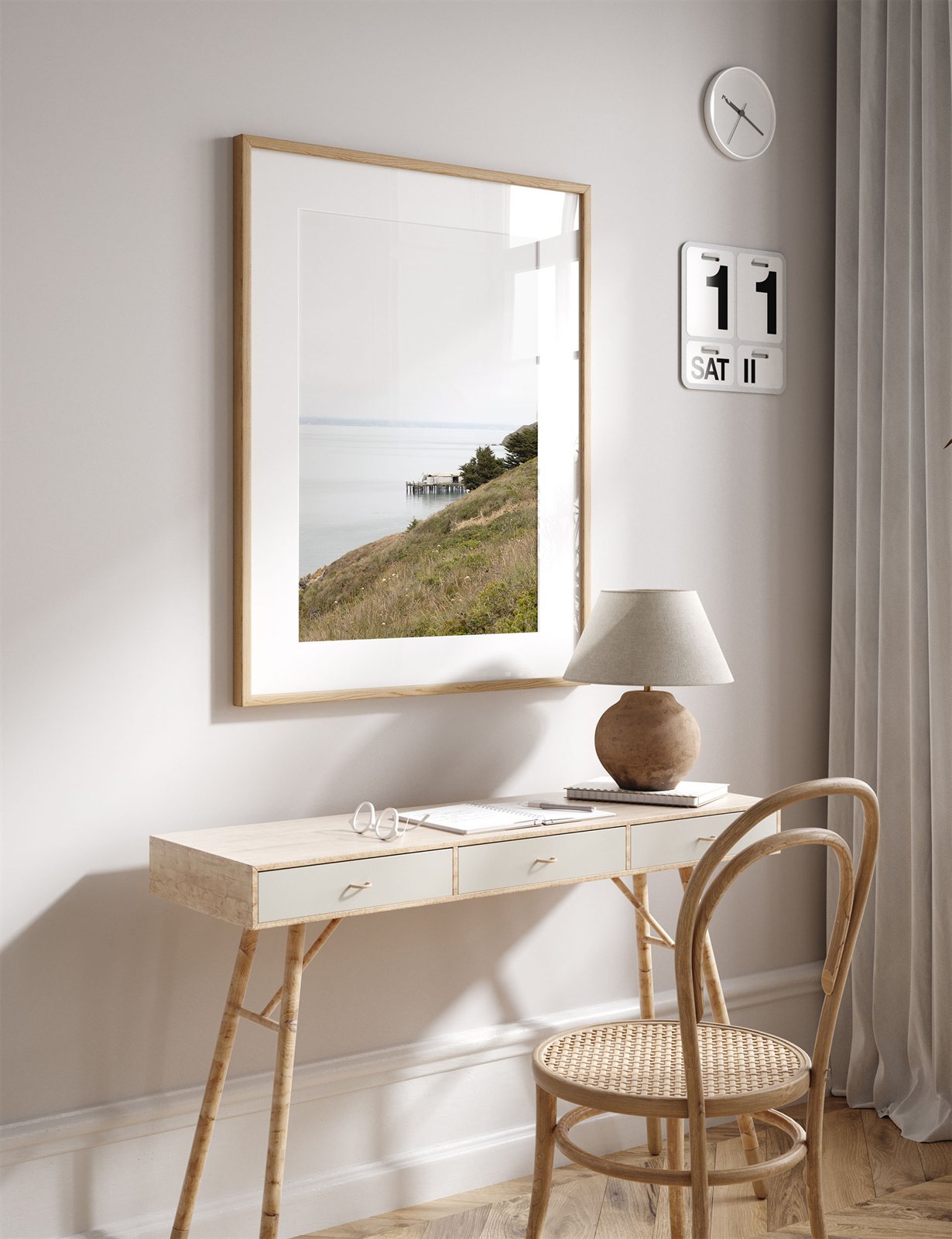 Framed photo of: Point Reyes 7379 displayed above a desk in a neutral room.