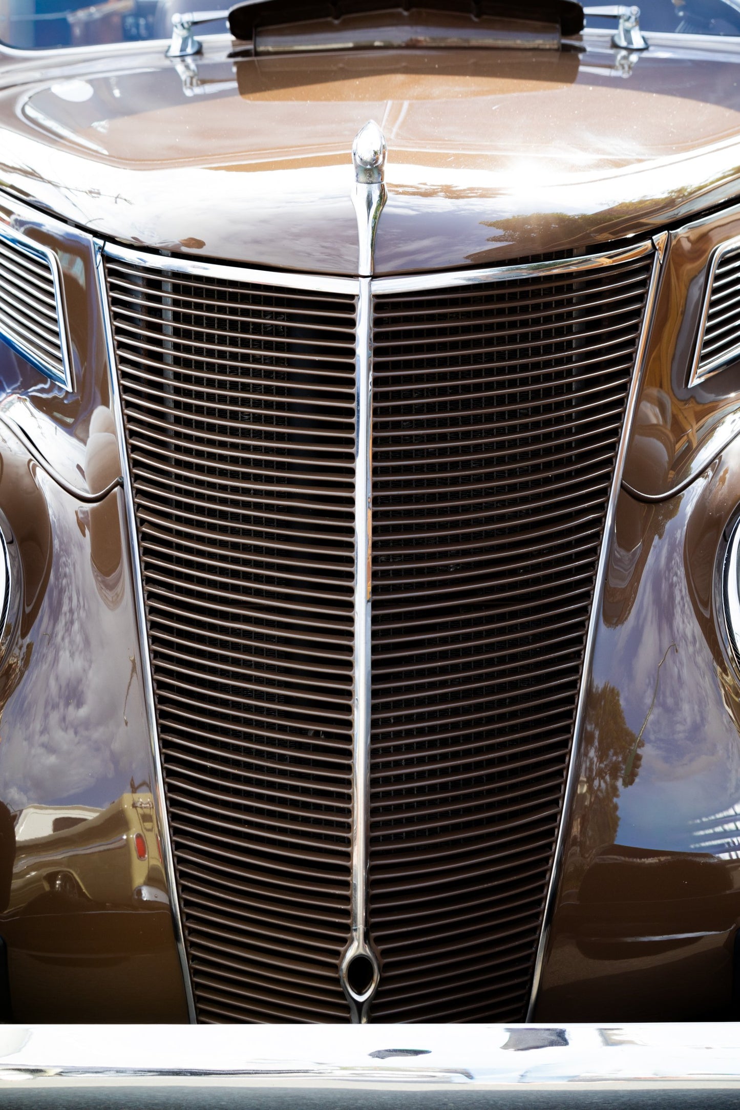 Photography by Salt Creek Prints of: Ford 7803, Close up image of the grill of a vintage Ford Delux. 