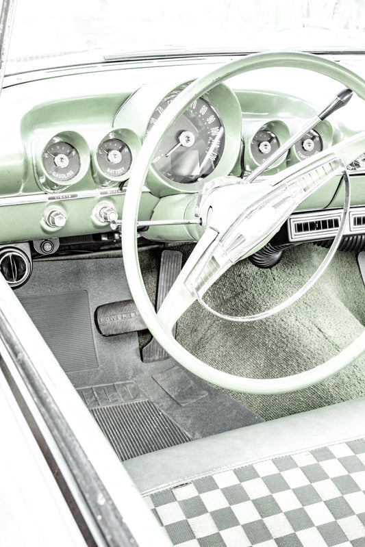 Photography by Salt Creek Prints of: Bel Air 7889, Close up image of the steering wheel and dash of a vintage Chevrolet Bel Air in mint green.