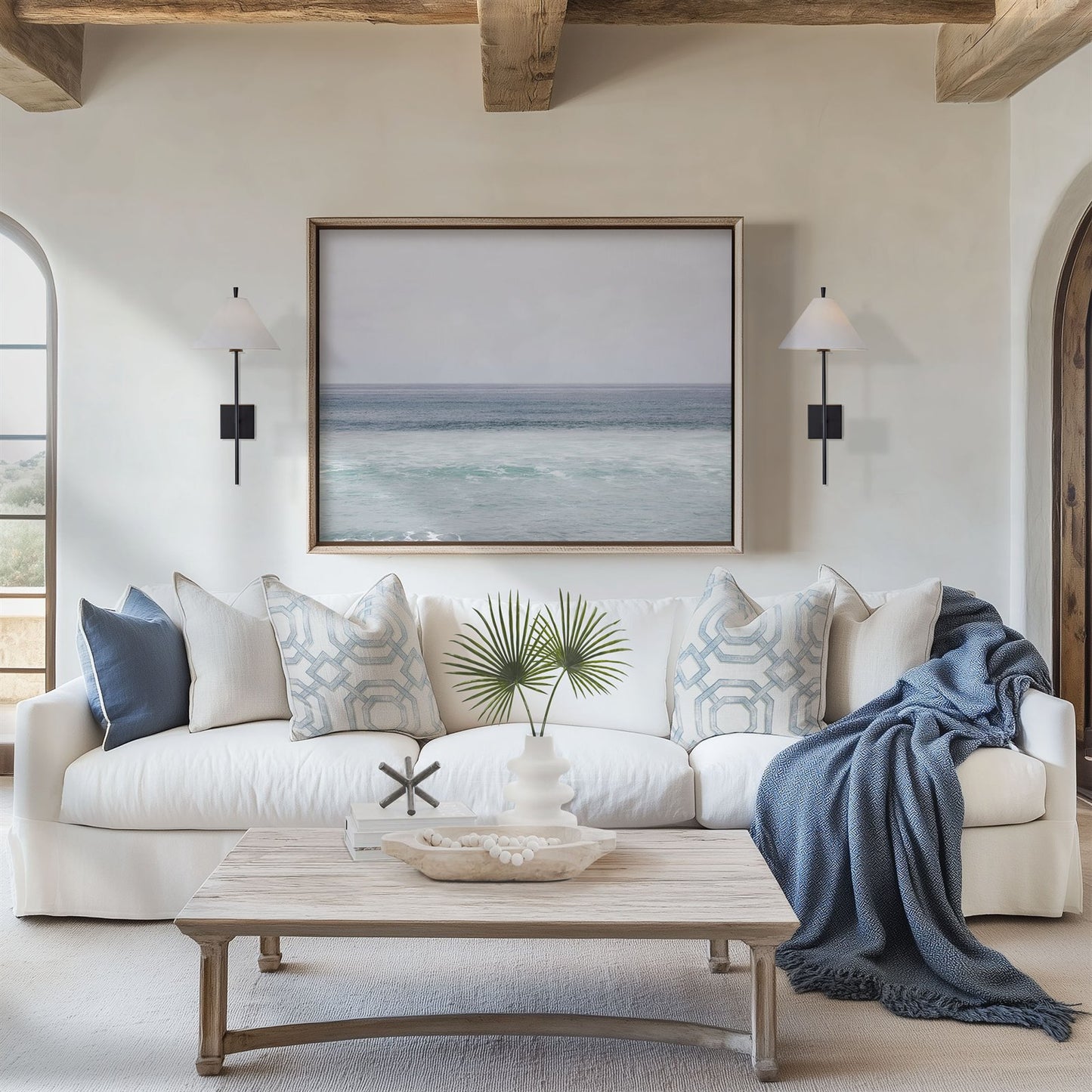 Framed photo of: Torrey Pines 8653 displayed above a couch in a coastal living room.