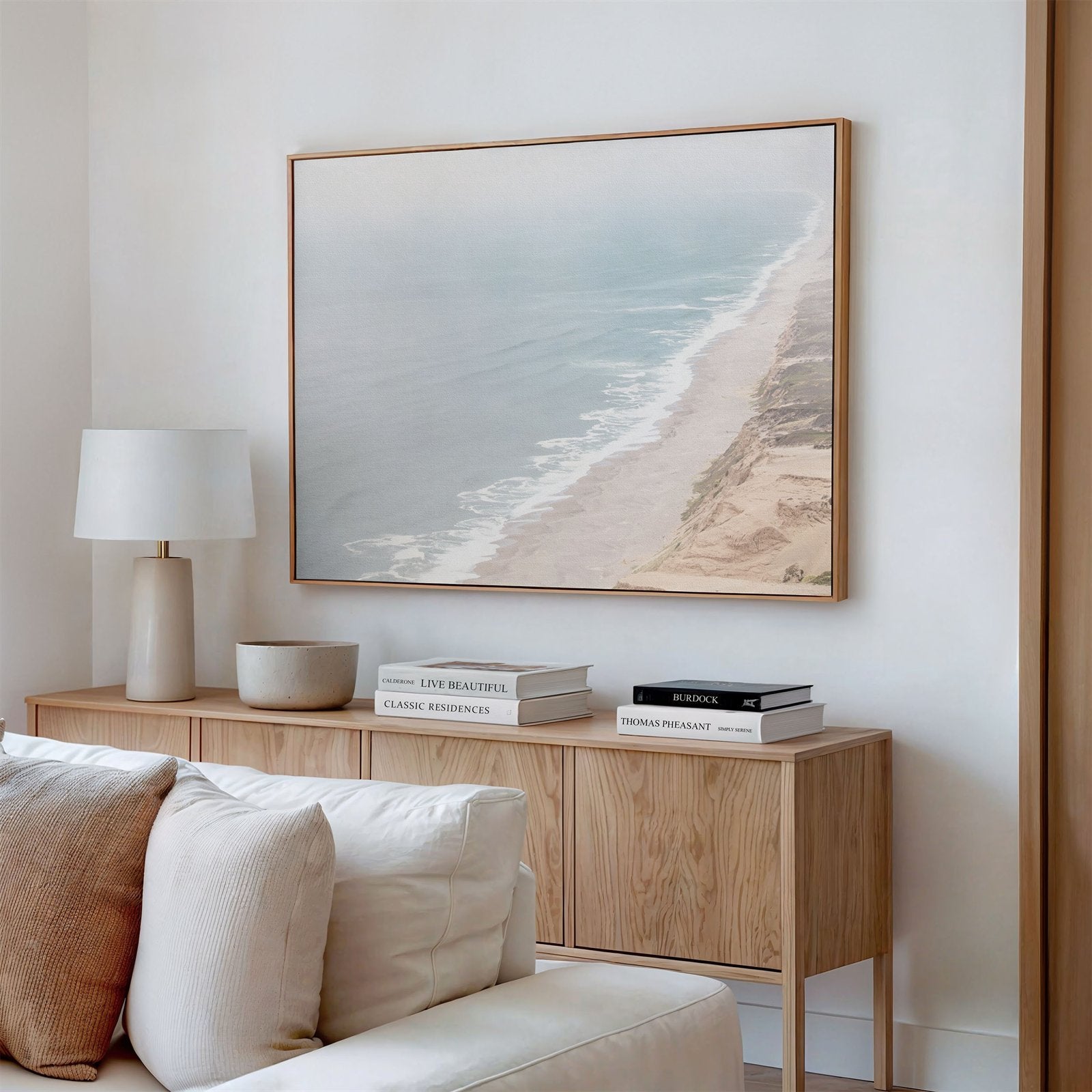 Framed canvas photo of: Point Reyes Beach 7415 displayed above a console in a modern living room.