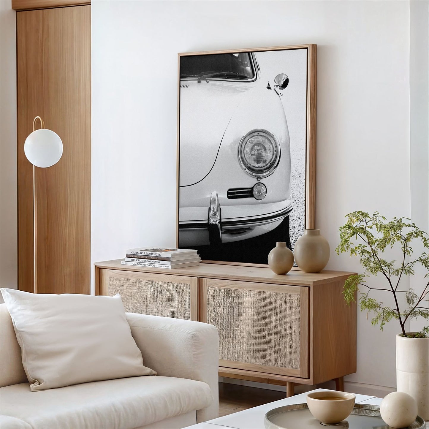 Framed canvas photo of: Porsche 8259 displayed above a console in a modern living room.