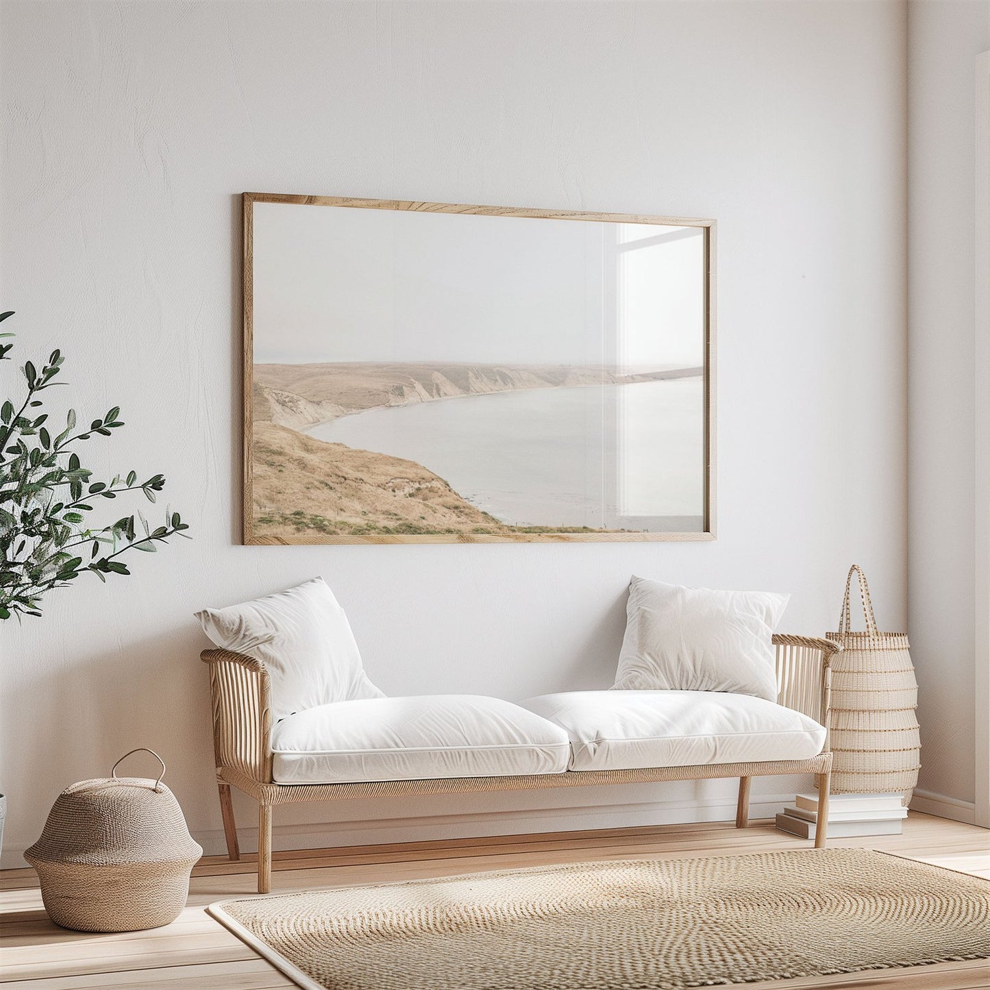 Framed photo of: Drakes Bay 7270 displayed on a wall above a couch in a neutral room.