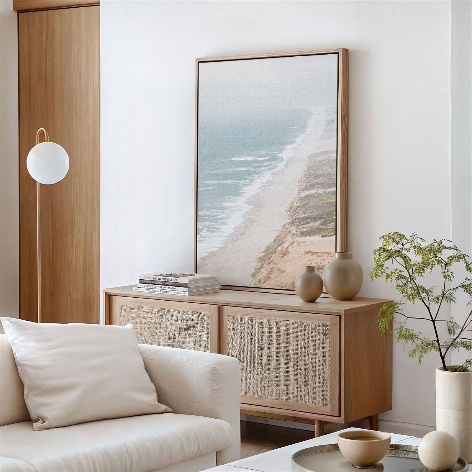 Framed canvas photo of: Point Reyes Beach 7430 displayed above a console in a modern living room.