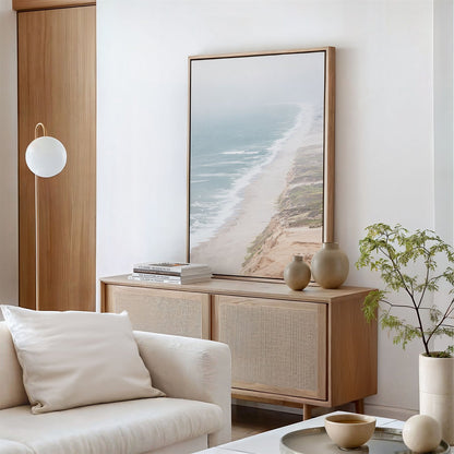 Framed canvas photo of: Point Reyes Beach 7430 displayed above a console in a modern living room.
