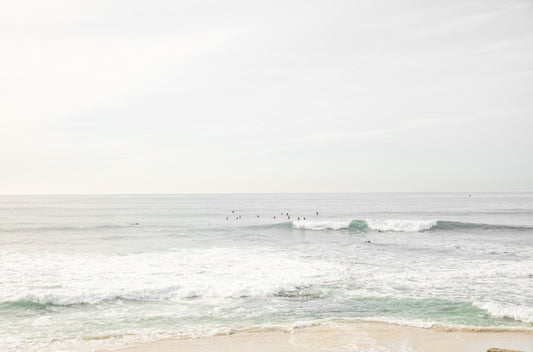 Photography by Kim Dybczak of: Bright Salt Creek shoreline with pale sand and gentle waves under clear coastal light.