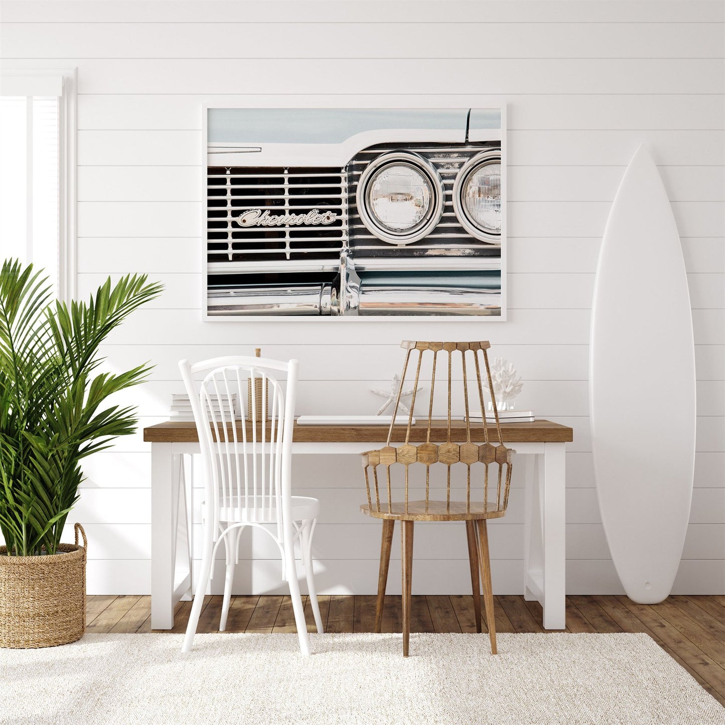 Framed photo of: Chevrolet 7965 displayed above a desk in a surf theme room.
