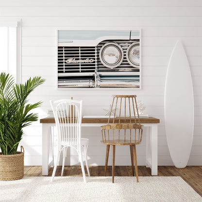 Framed photo of: Chevrolet 7965 displayed above a desk in a surf theme room.