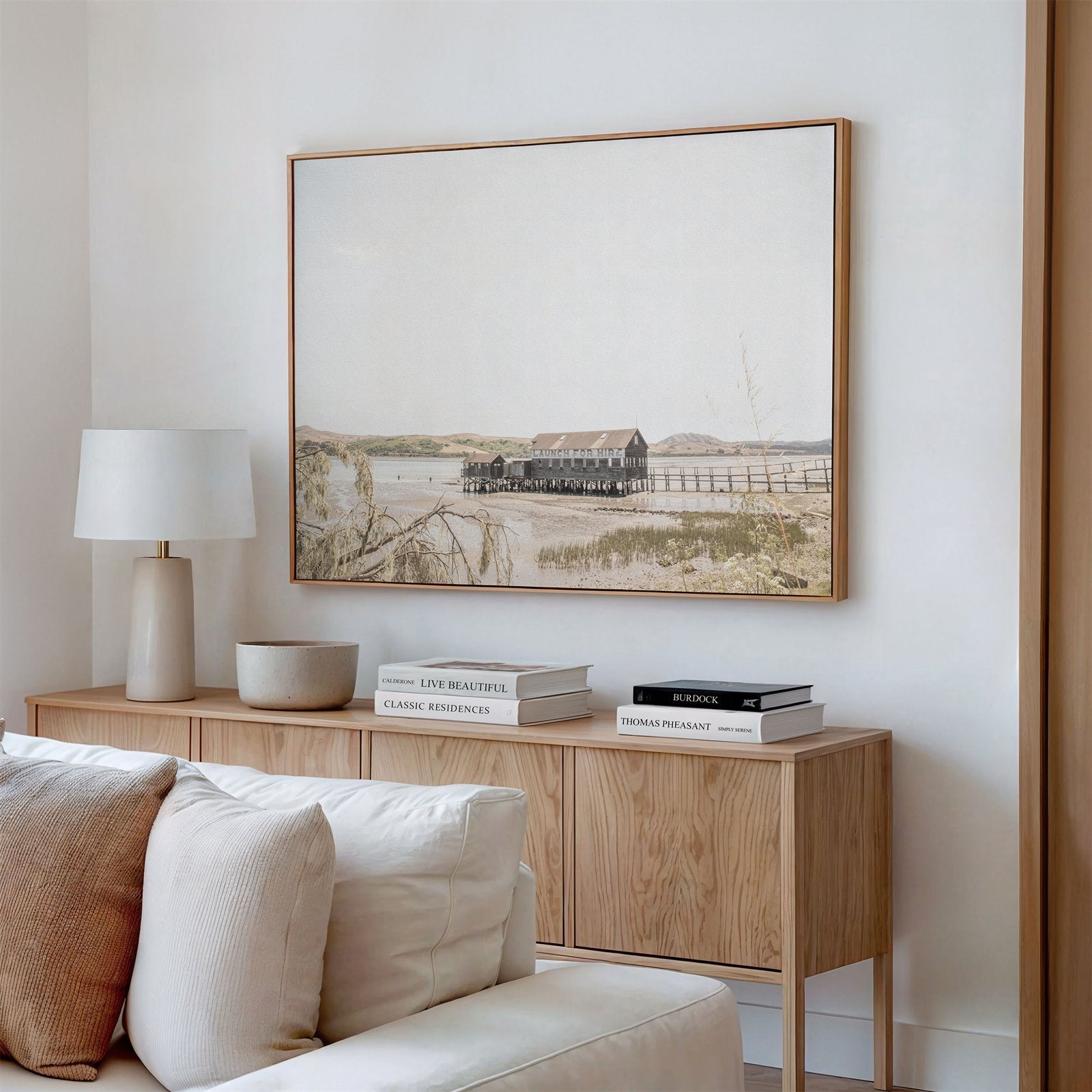Canvas framed photo of: Tomales Bay 7146 displayed above a couch in a modern living room.