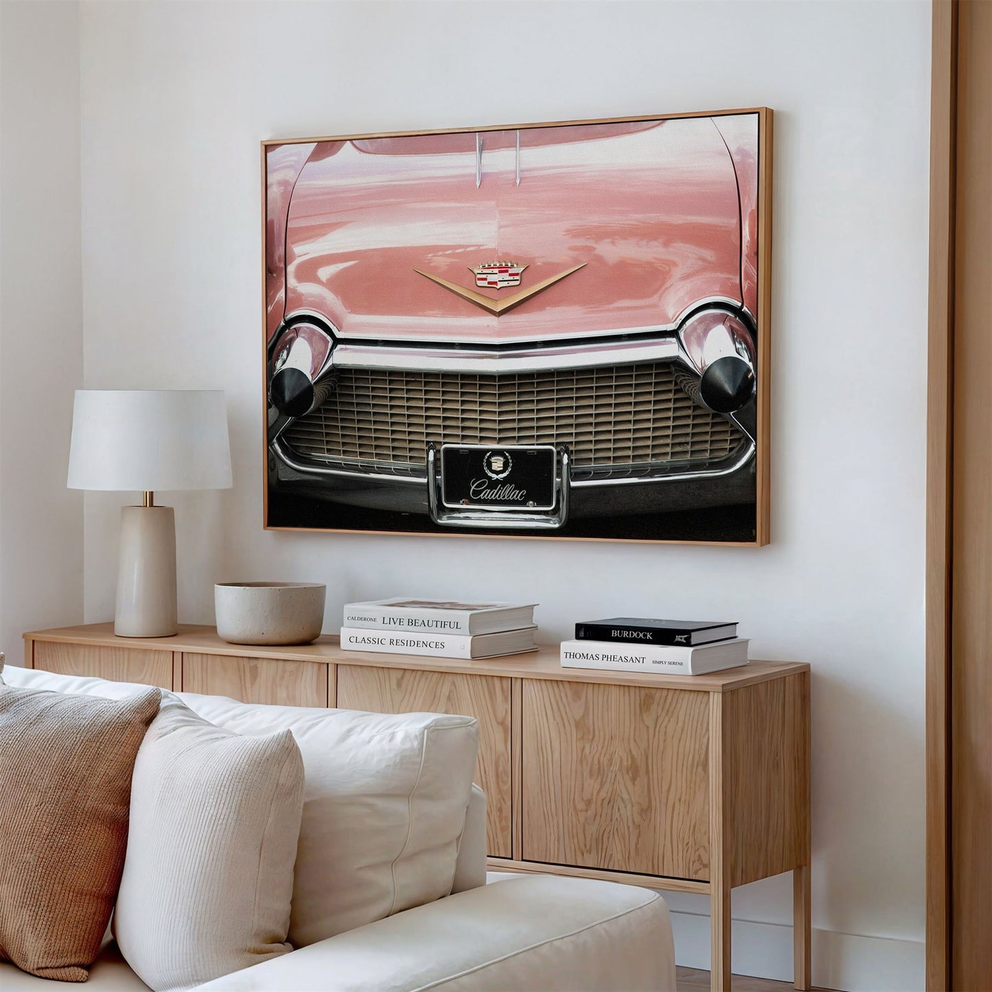Framed canvas photo of: Cadillac 7917 displayed above a couch.