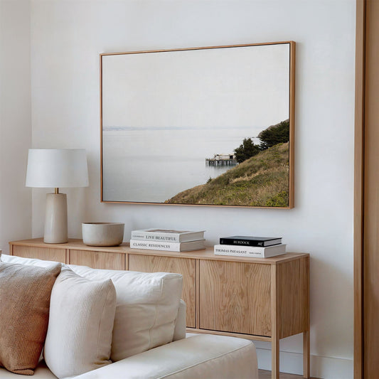 Framed canvas photo of: Point Reyes 7376 displayed above a couch in a neutral modern living room.
