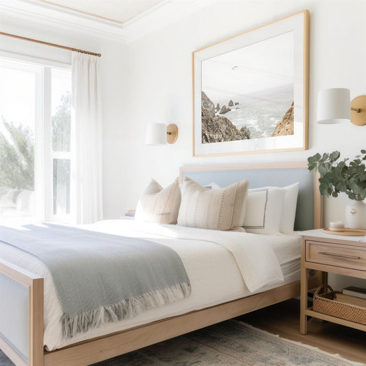 Framed photo of: Bodega Head 7714 displayed above a bed in a coastal bedroom.