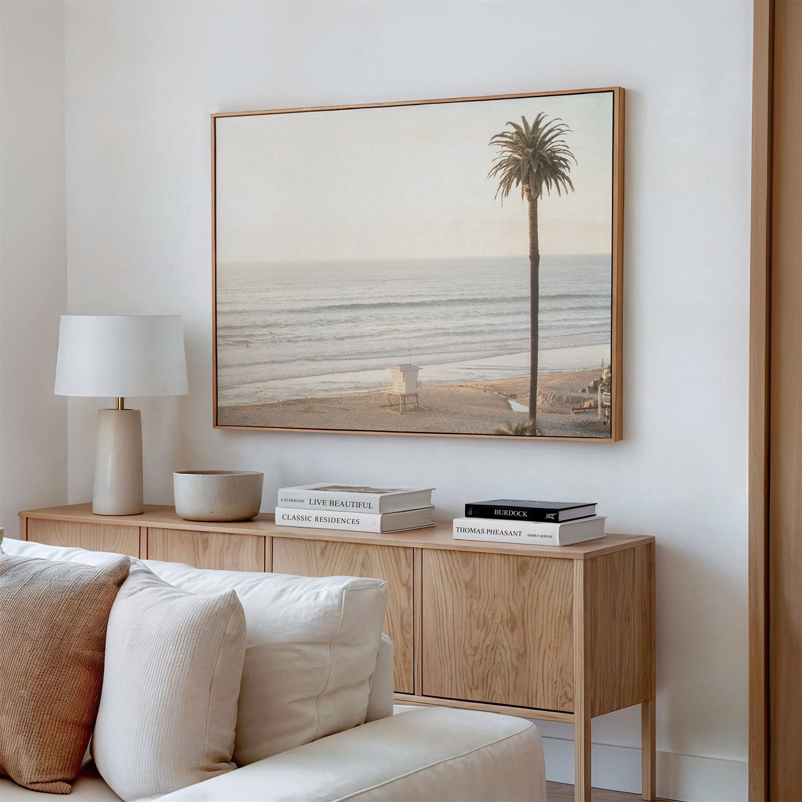 Framed canvas photo of: Moonlight Beach 9130 displayed on a living room wall. 