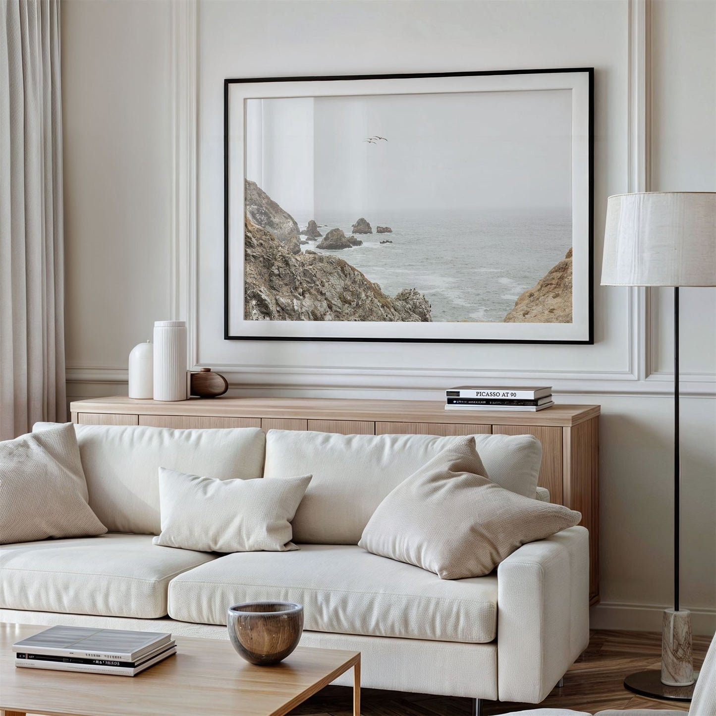 Framed photo of: Bodega Head 7714 displayed above a couch in a modern living room.