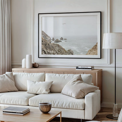 Framed photo of: Bodega Head 7714 displayed above a couch in a modern living room.