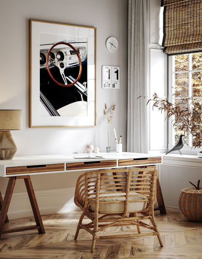 Framed photo of: Chevelle 7916 displayed above a desk.