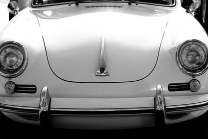 Photography by Salt Creek Prints of: Porsche 8258, Close up image of the front of a classic vintage Porsche in black and white. 